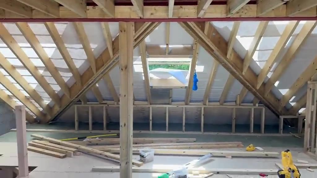 Loft conversion roof structure with new rooflights